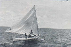 Photo of Natives in Sailboat (1957 USS Spangler Cruise Book) Photo of Natives in Sailboat
