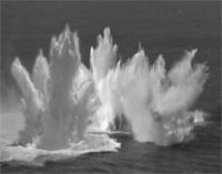 Photo of depth charge explosions - not from USS Spangler Photo of depth charge explosions